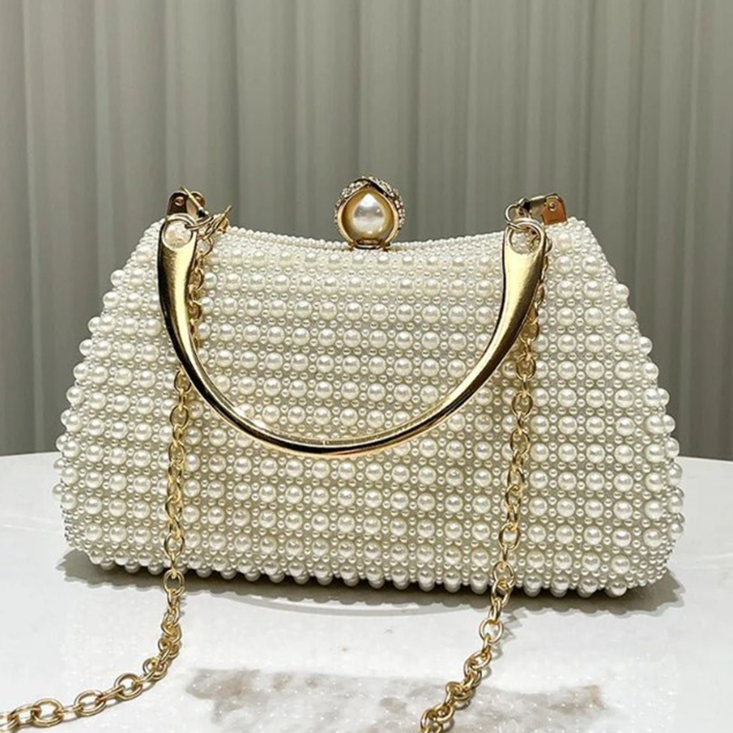 Cream White Uniform Bead Covered Framed Evening Vessel with Warm Metallic Curve Grip and Decorative Bead Clasp