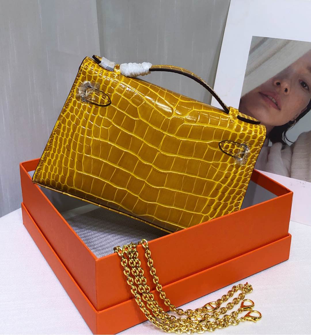 Kelly Pochette Jaune Ambre Shiny Niloticus Crocodile Leather Palladium Hardware Women Clutch Bag