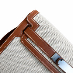 Kelly Depeches 25 clutch, canvas and swift leather (with additional shoulder strap), can be carried cross-body, can be carried by hand or on the wrist, daily needs, seamless switching between business
