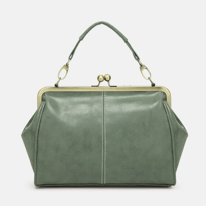 Multi-Tone Flared Gusset Vintage Framed Carry Vessel with Ornamental Metallic Kiss Lock Partitioned Inner Storage
