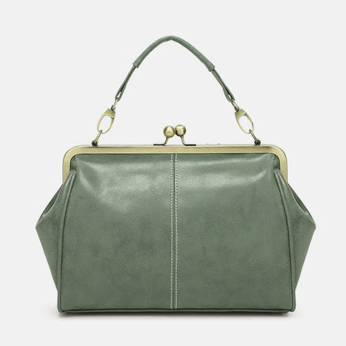 Multi-Tone Flared Gusset Vintage Framed Carry Vessel with Ornamental Metallic Kiss Lock Partitioned Inner Storage