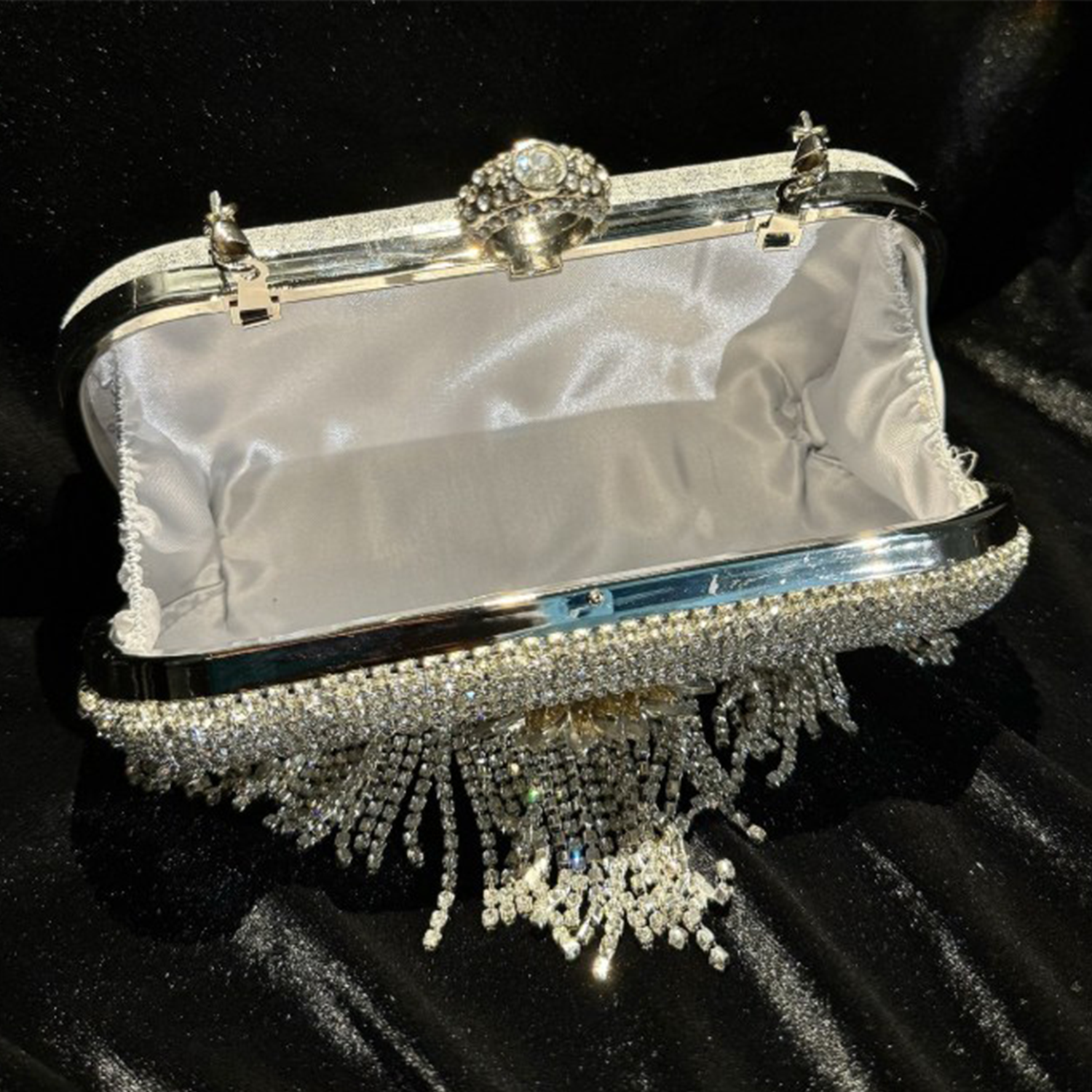 Silvery Crystal Encrusted Framed Evening Pouch with Cascading Shimmer Strands and Dual Carry Metal Fixtures